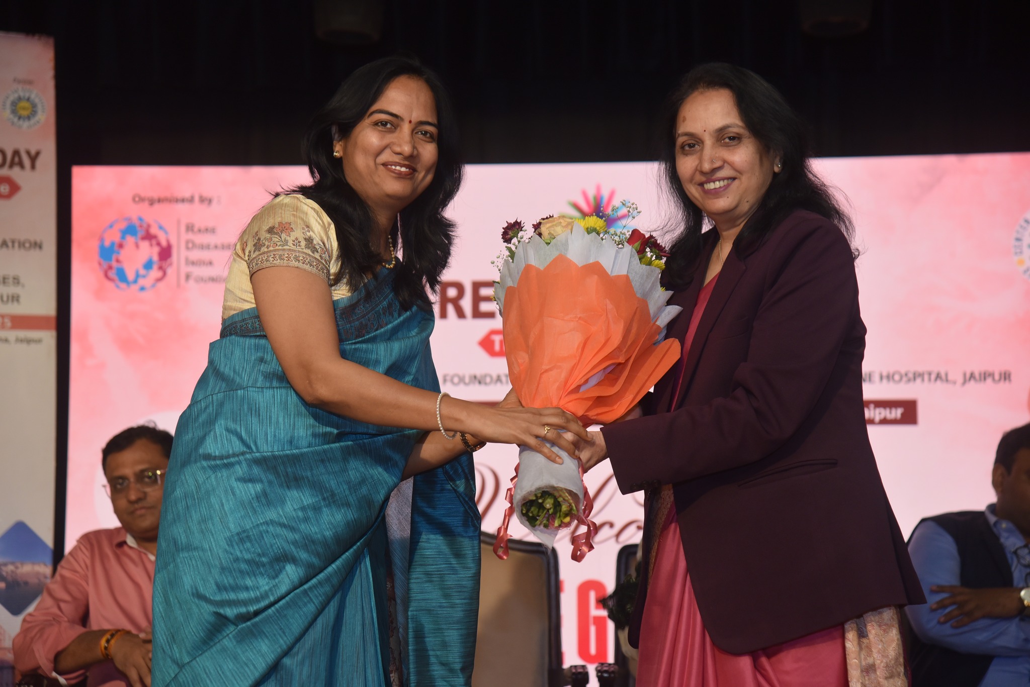 Attendees of the Rare Disease Day event in Jaipur posing for a group photo.